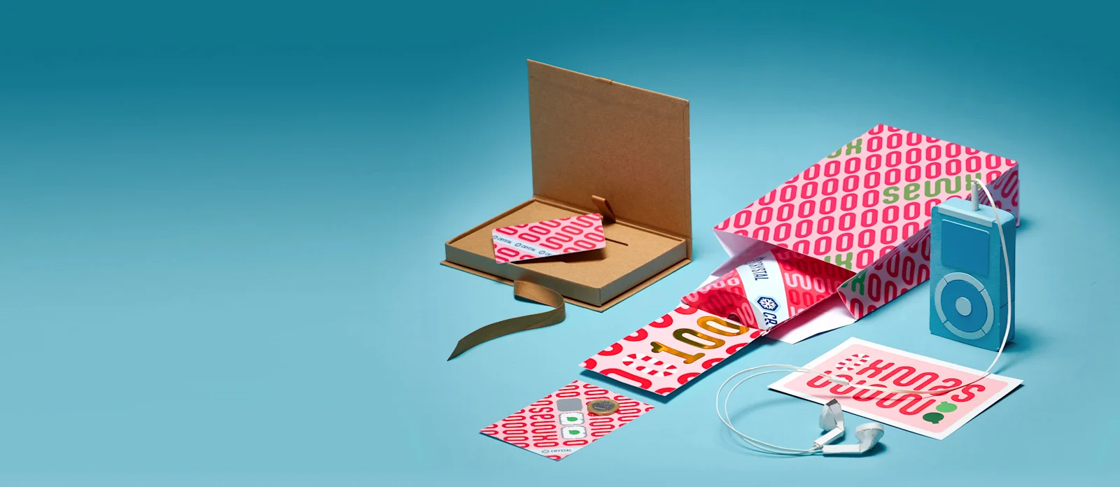 Gutscheinbox aus Karton, Gutschein, Rubbellos, Kundenkarte und Geschenktasche in rot-weißem Design